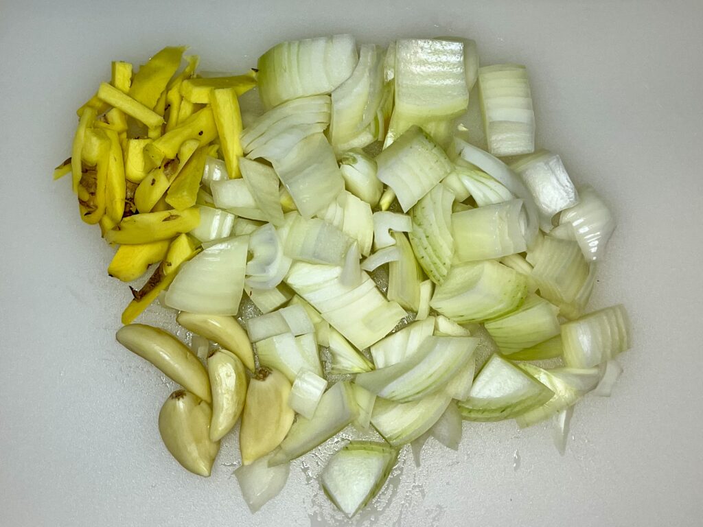 diced onion, peeled garlic, and julienned ginger