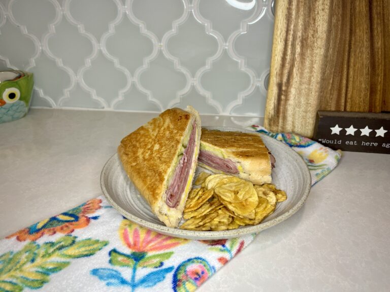 pressed Cuban sandwich on a plate