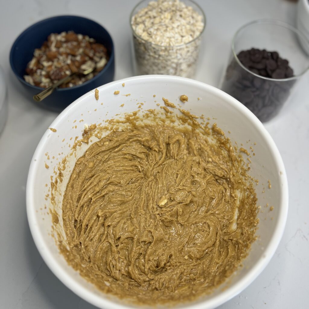 butter, vanilla, egg and sugar mixture in a large mixing bowl

