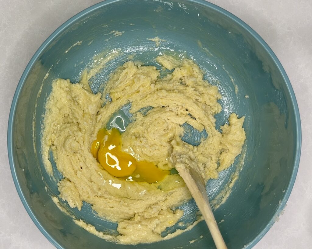 eggs stirred into butter and sugar