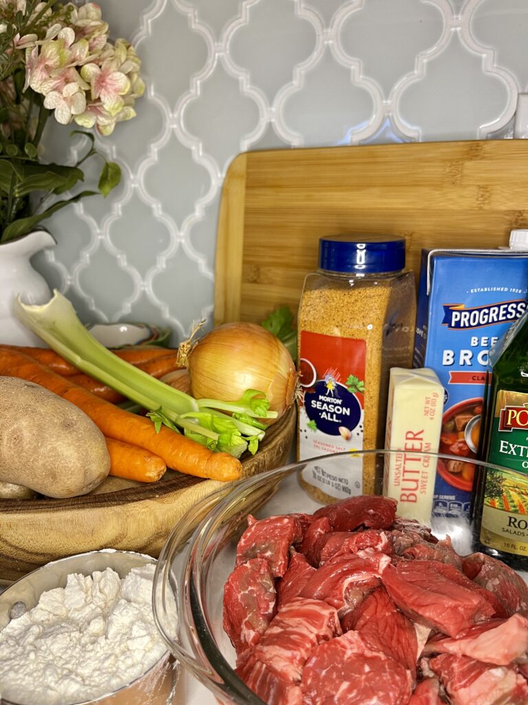 raw beef, flour, potatoes, celery, carrots, onions, seasoning, butter, broth and oil