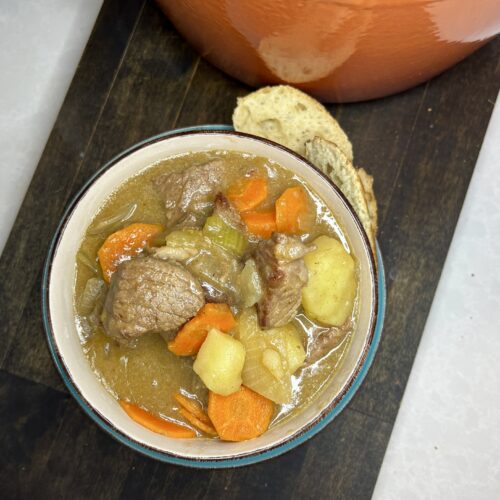 a bowl of cooked beef stew