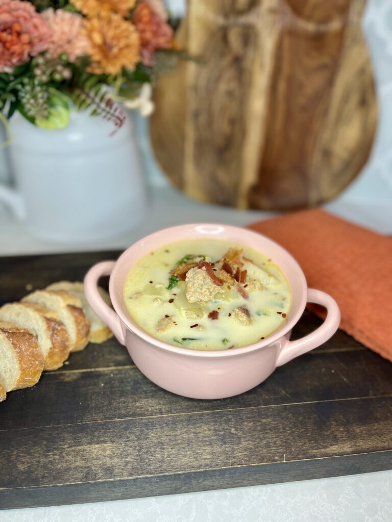 zesty Italian soup in a bowl with sliced bread