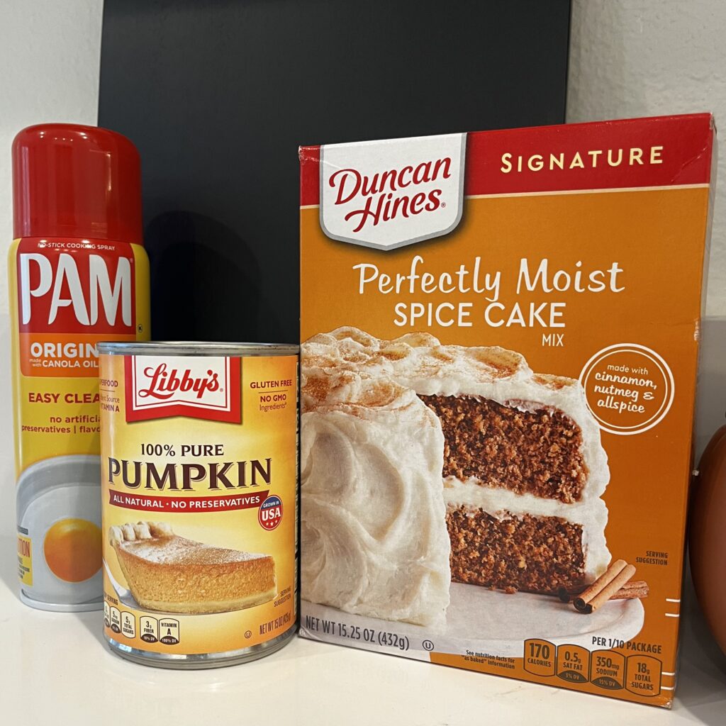 Pam cooking snappy, a can of pumpkin puree, spice cake mix on the counter
