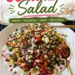 Colorful summer salad with fresh vegetables and feta cheese on a white plate, perfect for a healthy, easy, and delicious summer meal.