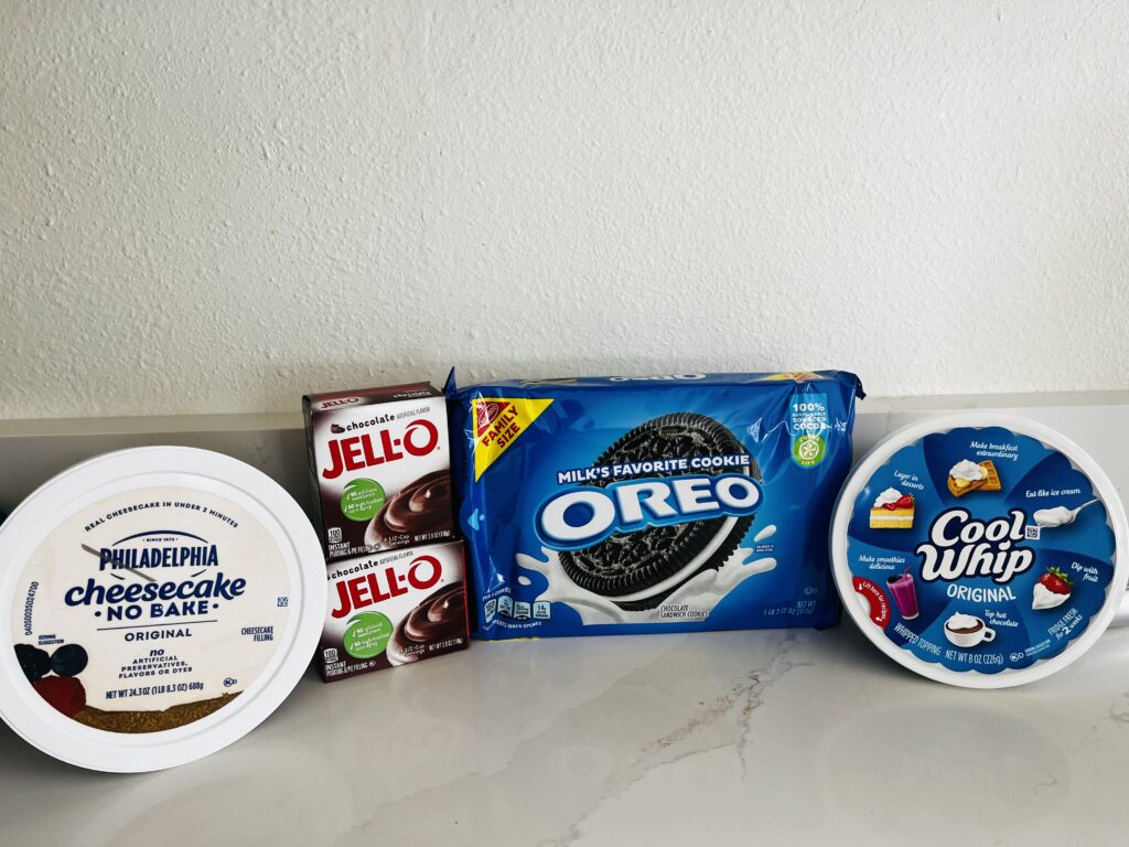 No bake cheesecake filling, chocolate  jello packets, Oreo cookies, cool whip on the counter.