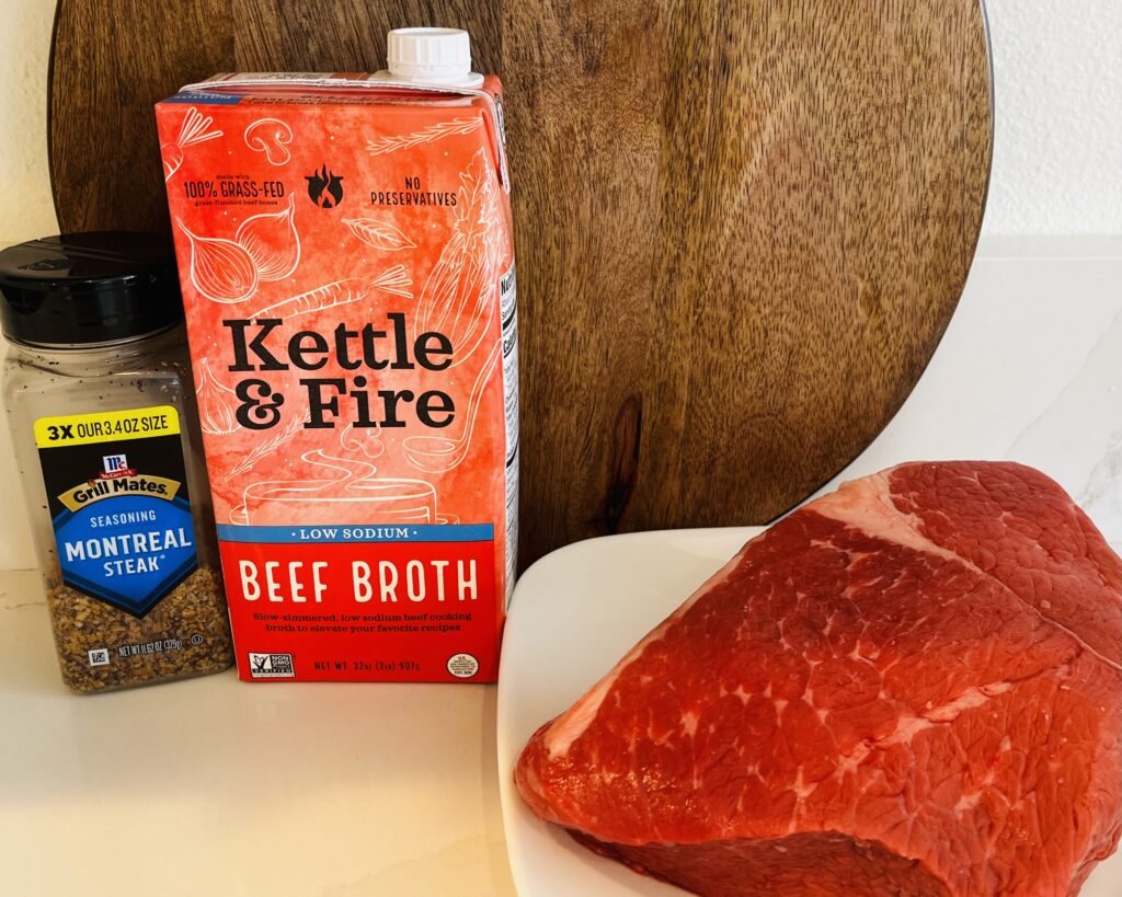  low sodium beef broth, 2.4lb chunk roast, Montreal steak seasoning on the counter