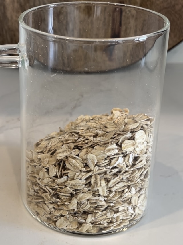 Oats in a glass jar on counter