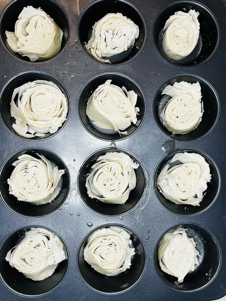 round cut Phyllo pieces in muffin tin