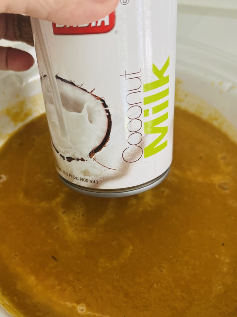 Adding coconut milk to the soup in slow cooker