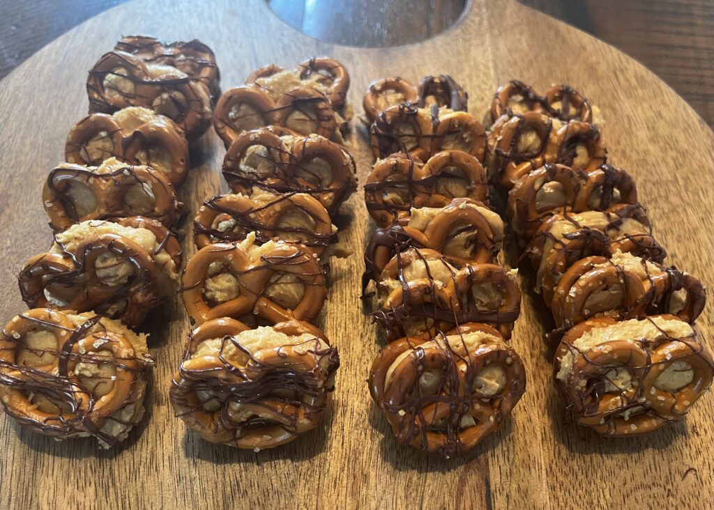 Splattered chocolate, decorating the nut butter bites.