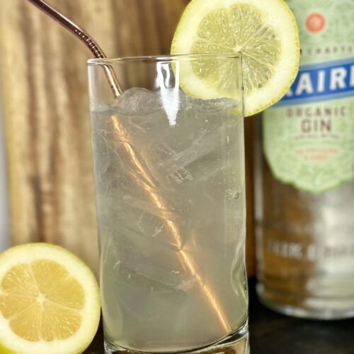 a Tom Collins cocktail with gin, seltzer, and lemon