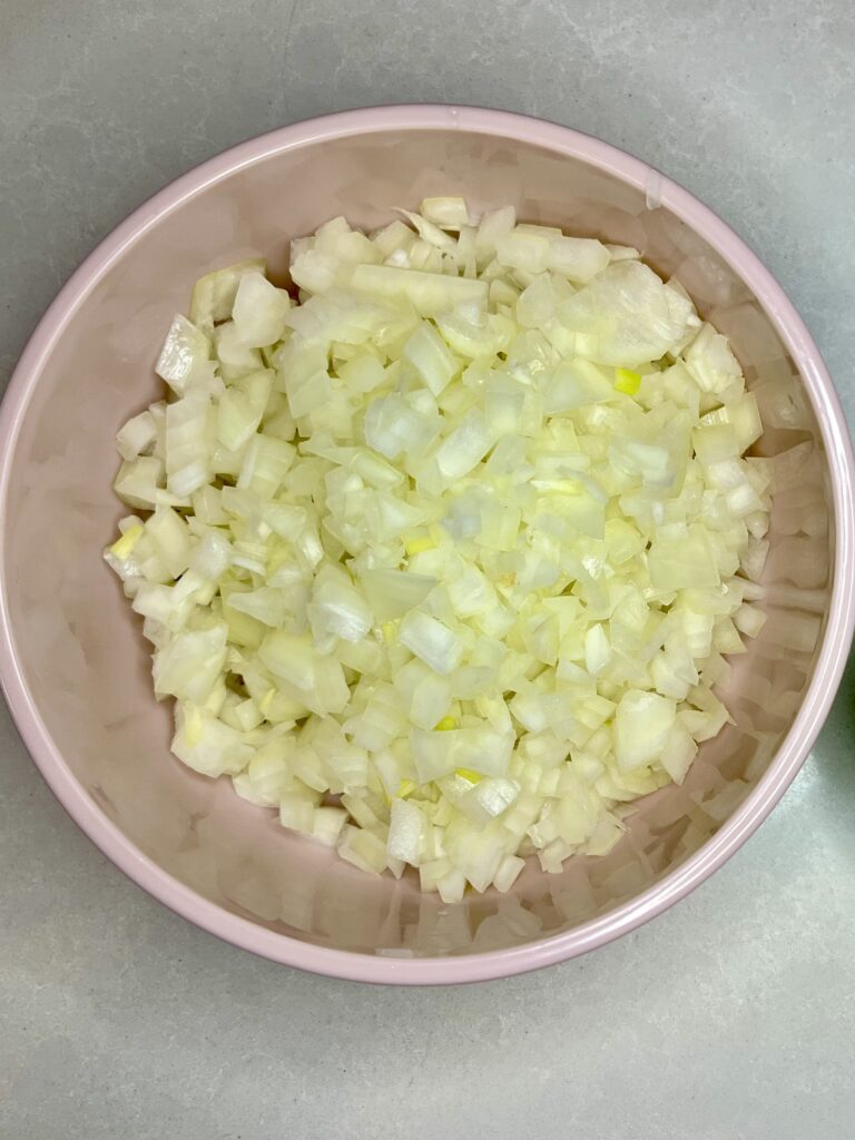 a bowl of diced onions