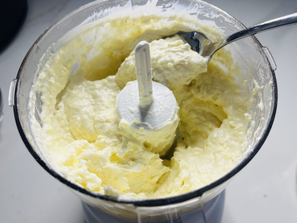 pureed cream cheese, parmesan cheese, mayo and garlic pureed in a food processor