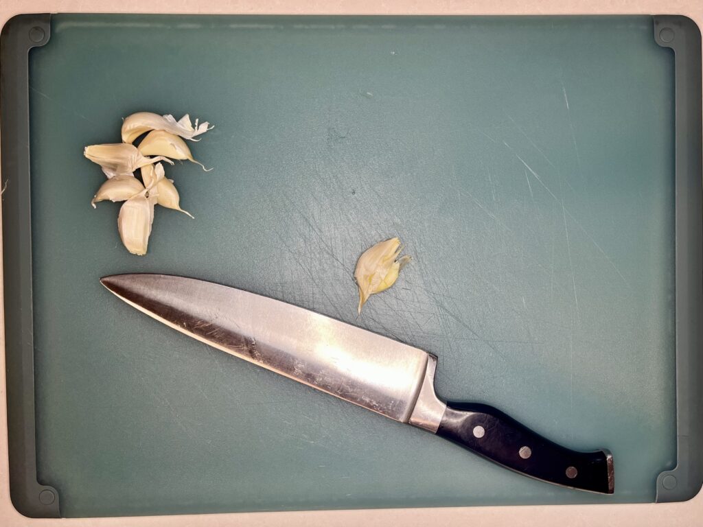 a crushed bulb of garlic