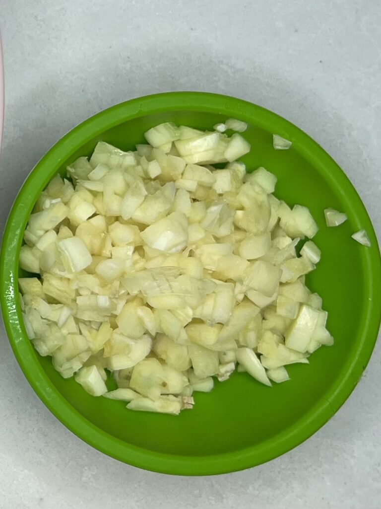 a small bowl of minced garlic