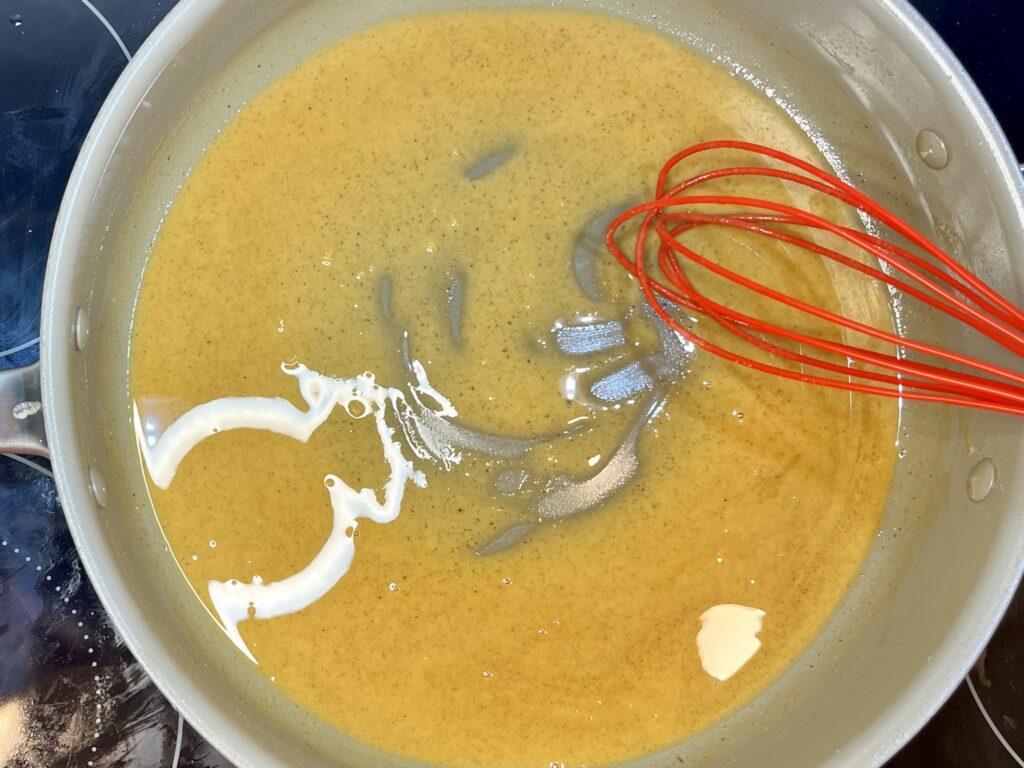 flour and butter being cooked to make a roux