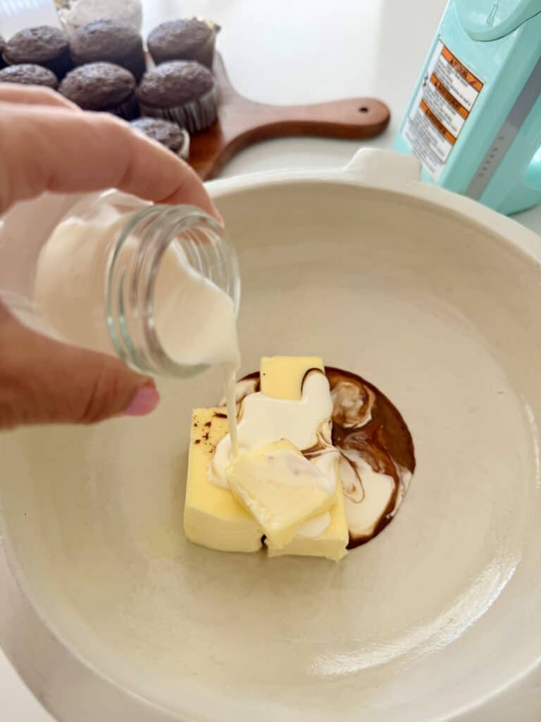 Heavy cream over instant coffee powder and water and unsalted butter