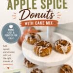 Easy Apple Spice Donuts with Cake Mix on a white plate, drizzled with icing, featuring a fall-inspired theme for cozy autumn treats.
