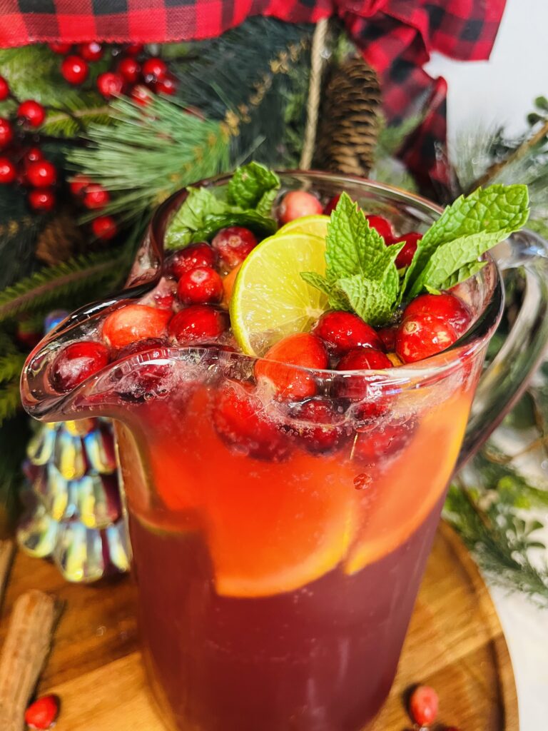 Christmas punch on a brown tray on the counter