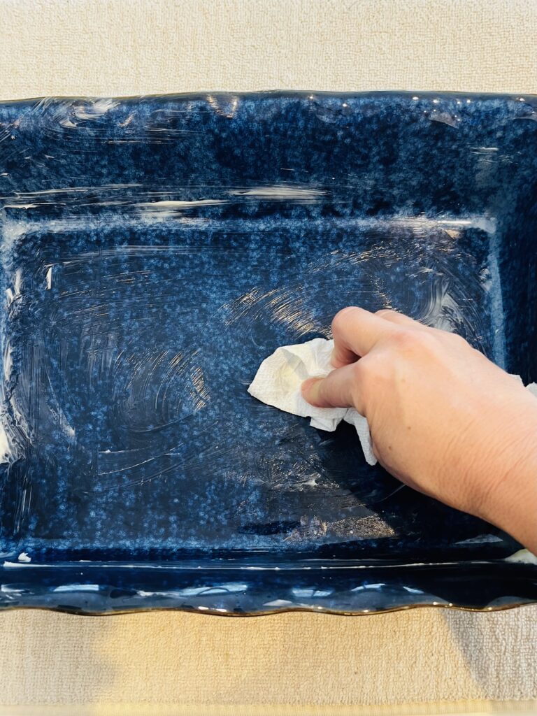 greased casserole dish on the counter