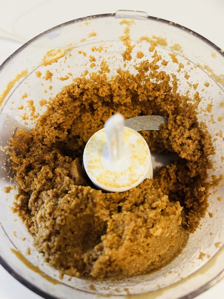 mixed together butter and ginger snap cookies in a small food processor.