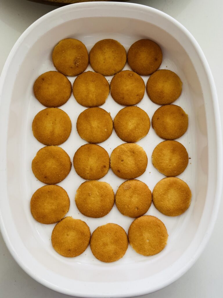 white baking dish with Nilla wafers in it on the counter.