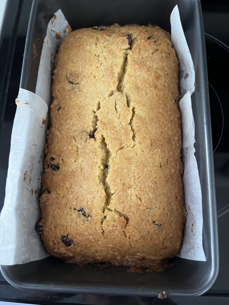 cranberry and eggnog loaf in a loaf pan on the stovetop 