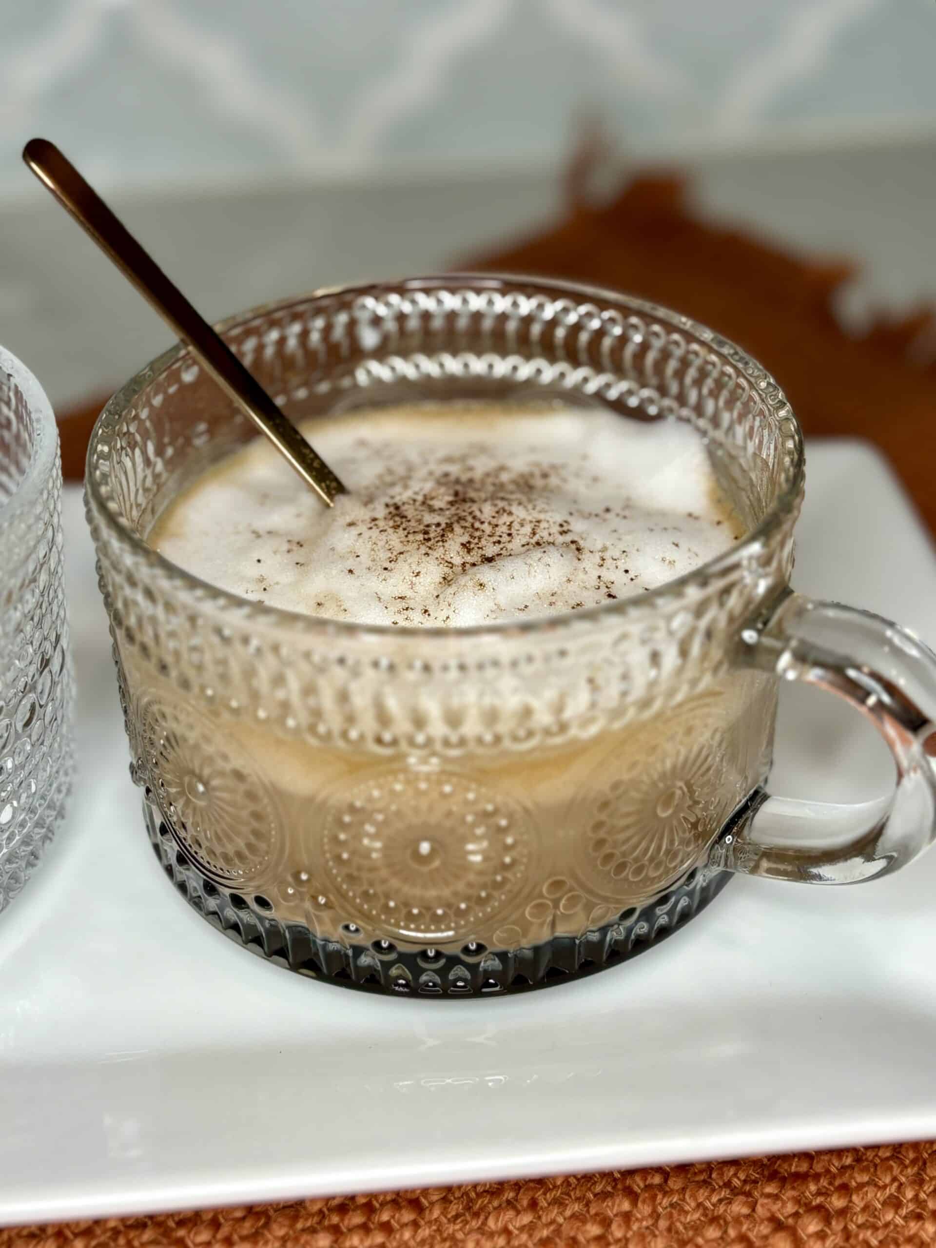 a hot mochaccino on a plate