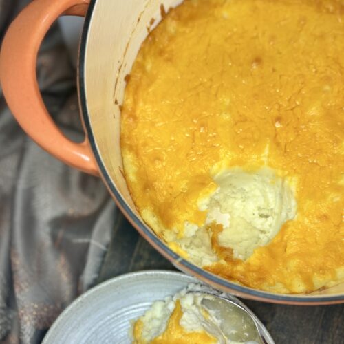 cheesy holiday potatoes scooped onto a plate