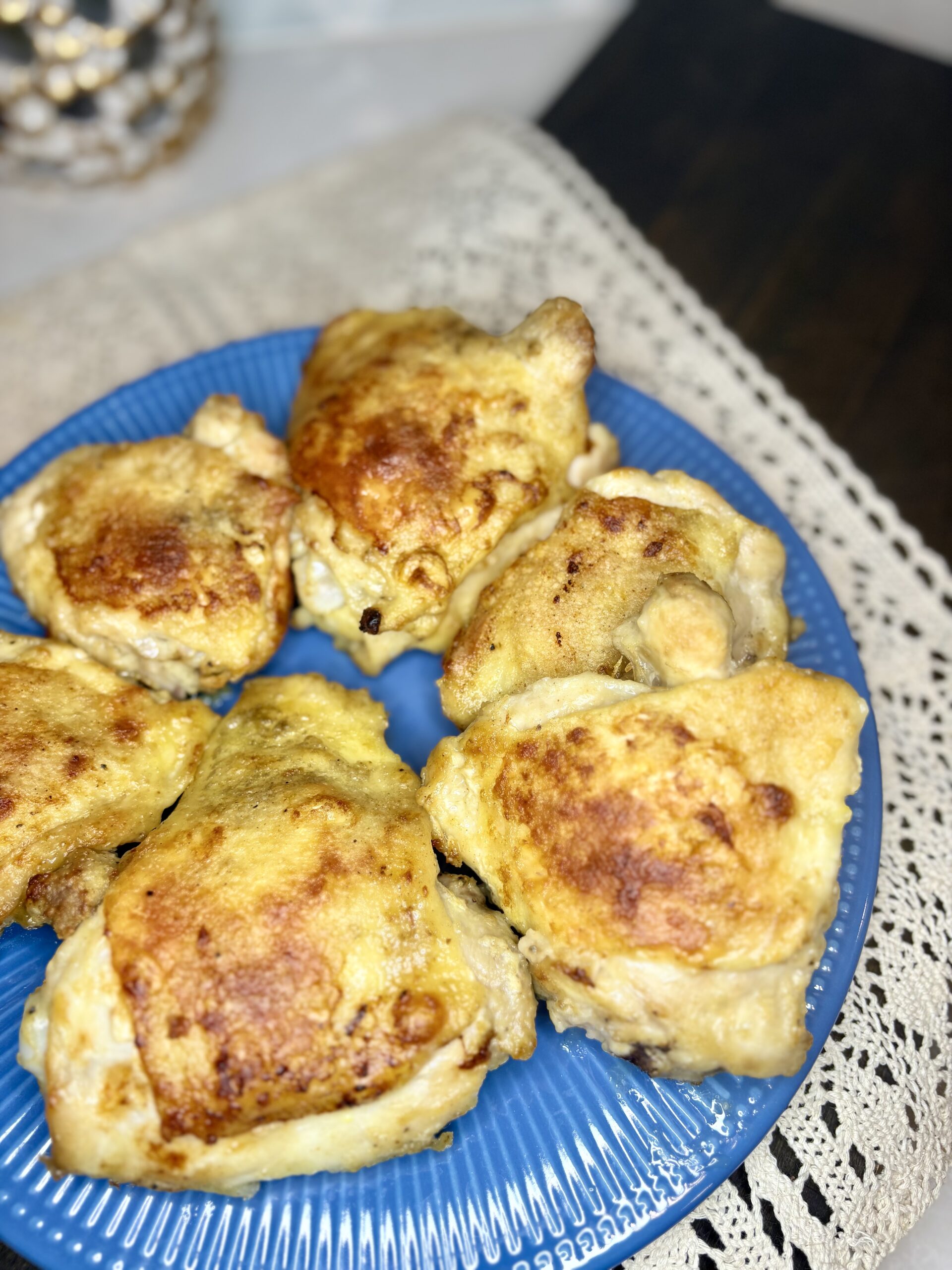 A plate of oven fried chicken thighs