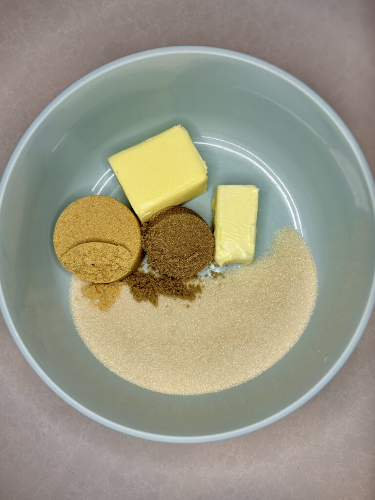 butter, granulated sugar, light and dark brown sugar and crisco in a bowl