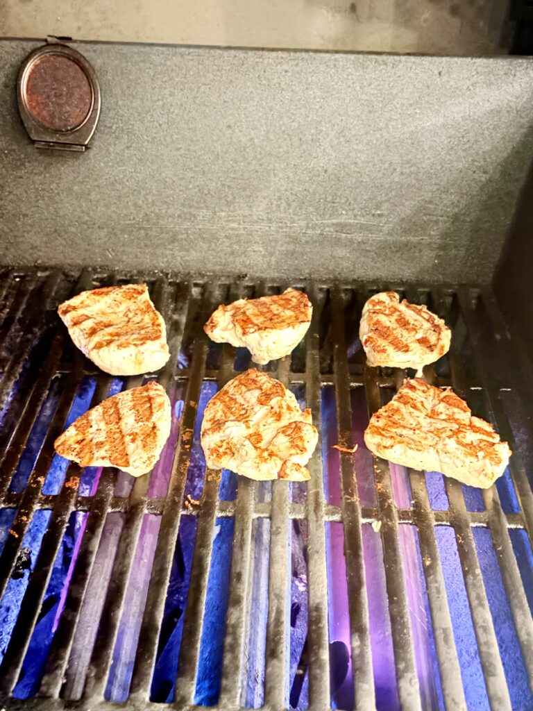 cooked chicken on a grill