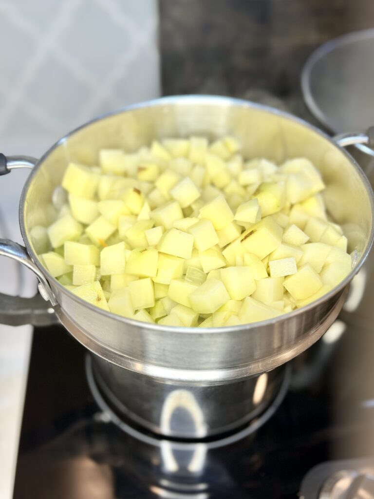 potatoes added to the steamer basket