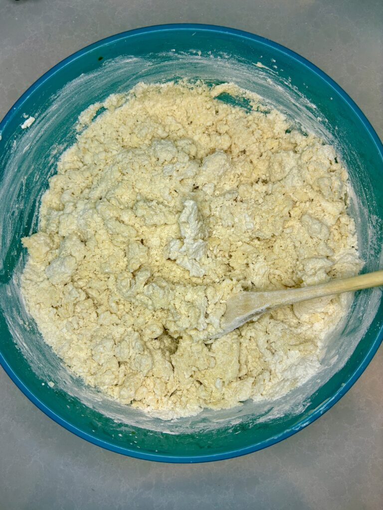 a bowl of crumble dough