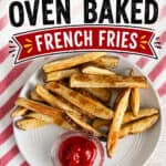 Crispy oven-baked French fries served with ketchup on a white plate, perfect for a healthy snack or side dish, showcasing homemade, golden, and crunchy potato fries.