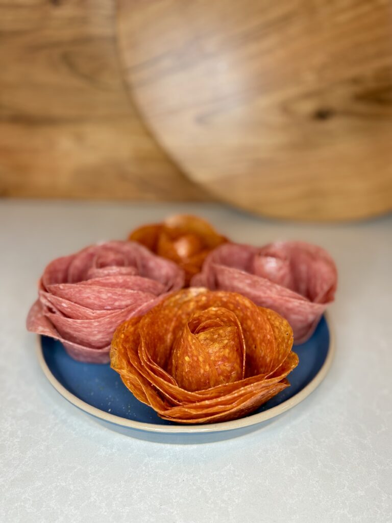 charcuterie roses made out of salami and pepperoni