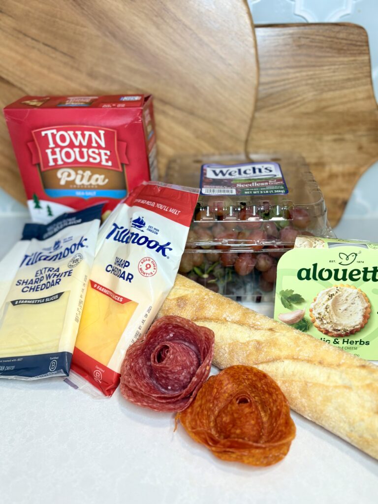 an assortment of possible ingredients for a charcuterie board