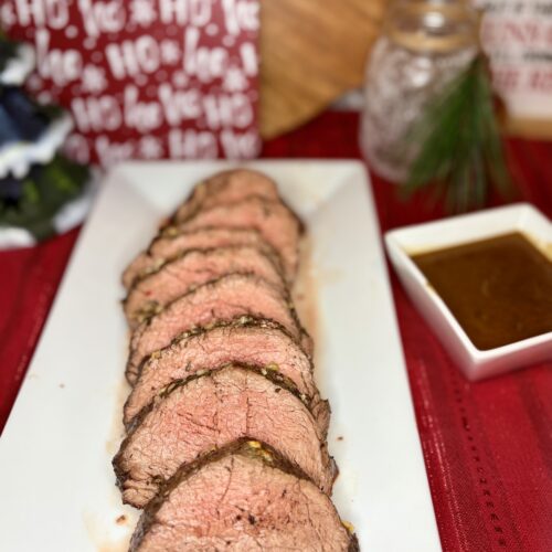 cooked beef tenderloin on a serving platter