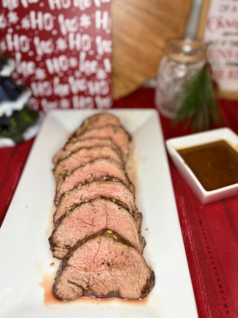 cooked beef tenderloin on a serving platter