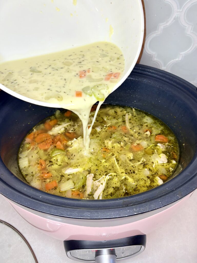 broth/flour mixture being added back to slow cooker.