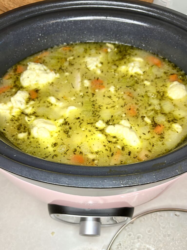 uncooked dumping on top of ingredients in slow cooker