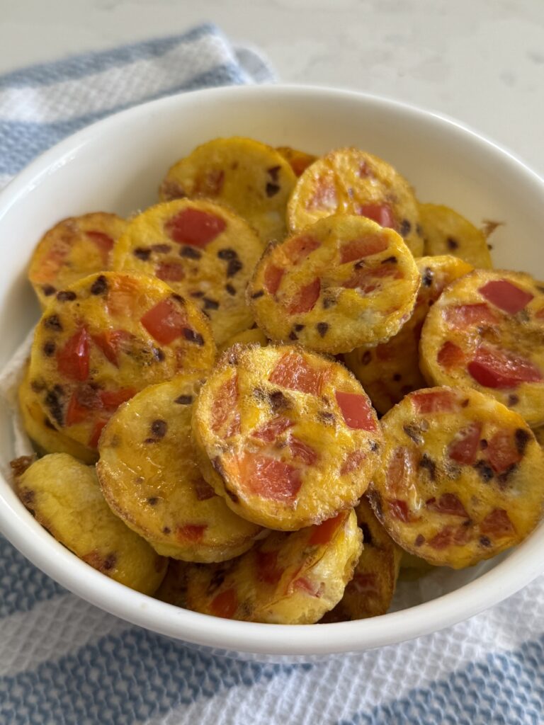 Spicy Red Pepper Egg Bites in white bowl on the counter.