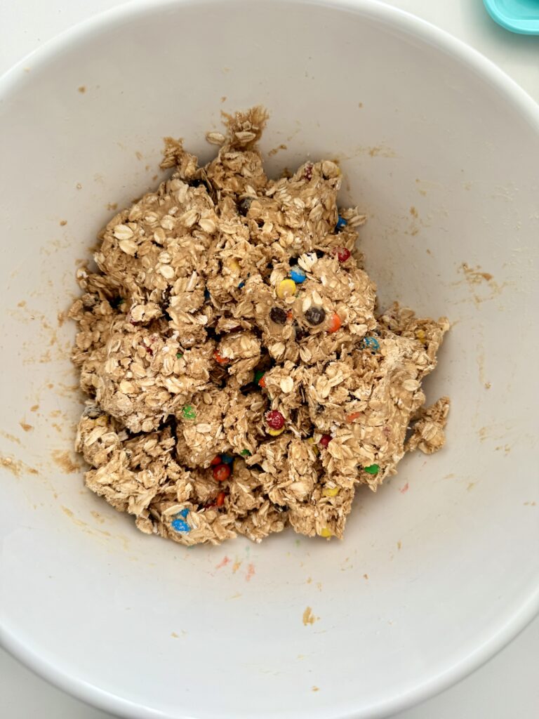 Mixed ingredients in a large white mixing bowl on the counter.