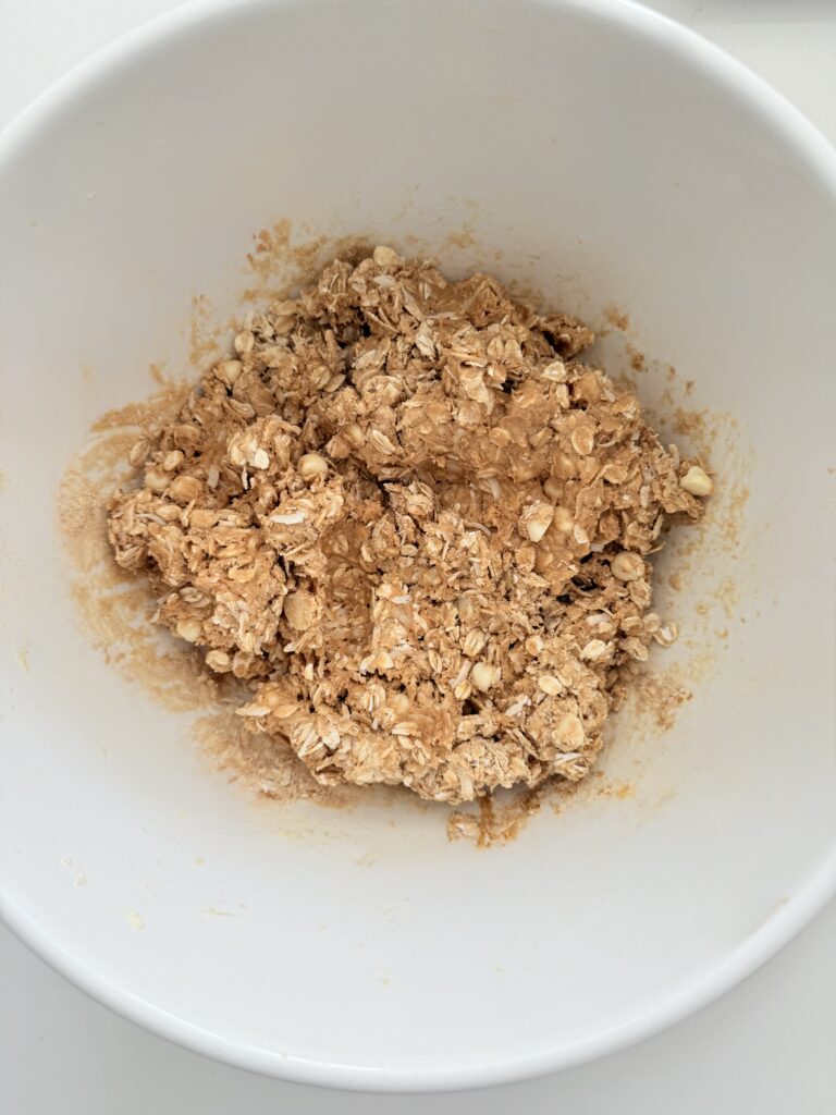 mixed dough in a large white mixing bowl on the counter.