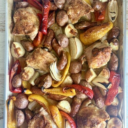 Delicious chicken and andouille sausage sheet pan meal with colorful bell peppers and onions, roasted to perfection for a hearty, flavorful dinner. Easy, quick, and perfect for weeknights.