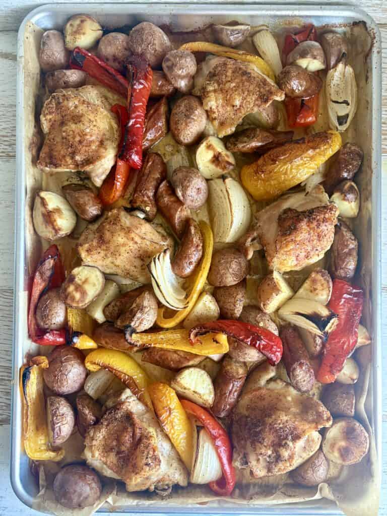 Delicious chicken and andouille sausage sheet pan meal with colorful bell peppers and onions, roasted to perfection for a hearty, flavorful dinner. Easy, quick, and perfect for weeknights.