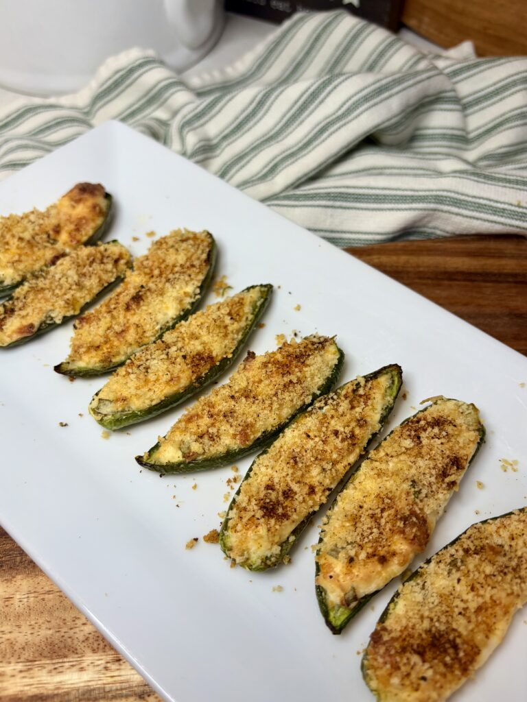 cooked jalapeño poppers on a plate