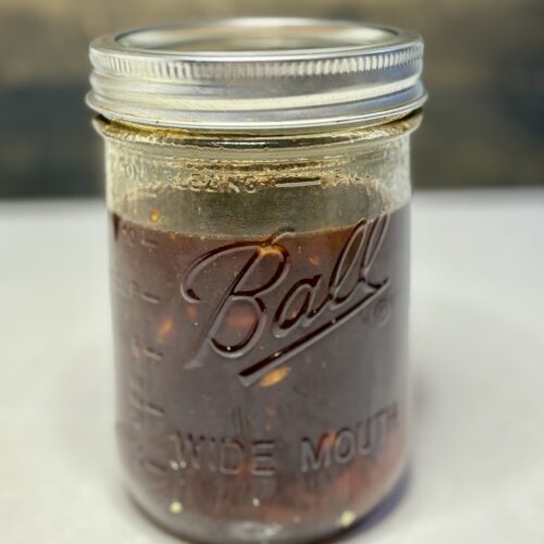 a jar full of huli huli sauce