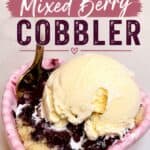 EASY Mixed Berry Cobbler with vanilla ice cream in a pink heart-shaped dish, topped with berry filling and a scoop of ice cream, perfect for a quick and delicious dessert.